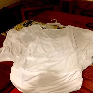 White blouse on blouse see through sleeves.